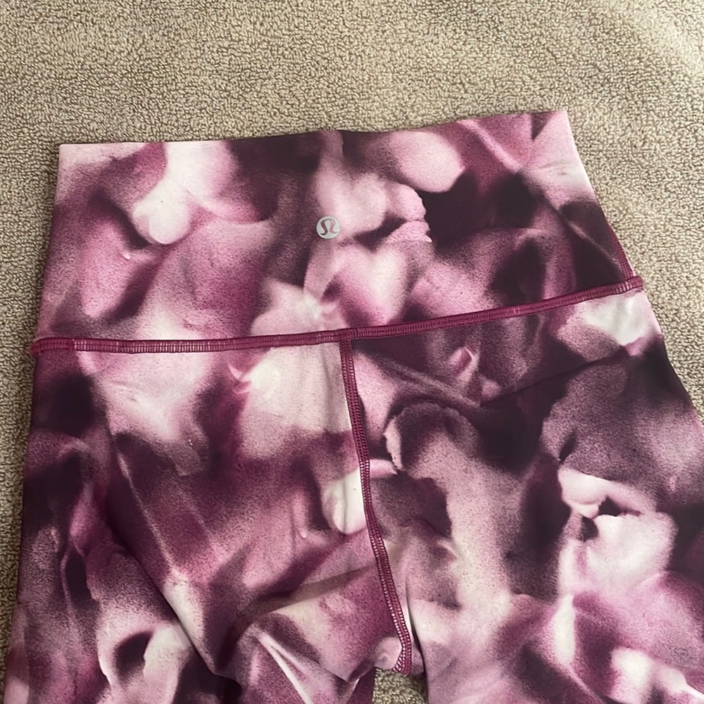 Pink and white Lululemon leggings